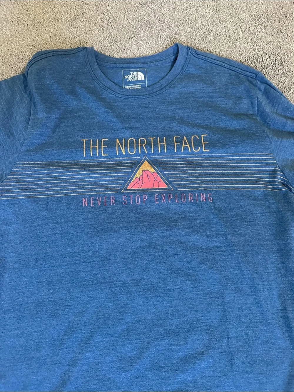 The North Face Men’s Blue Short Sleeve Graphic Tee with Pink Accent